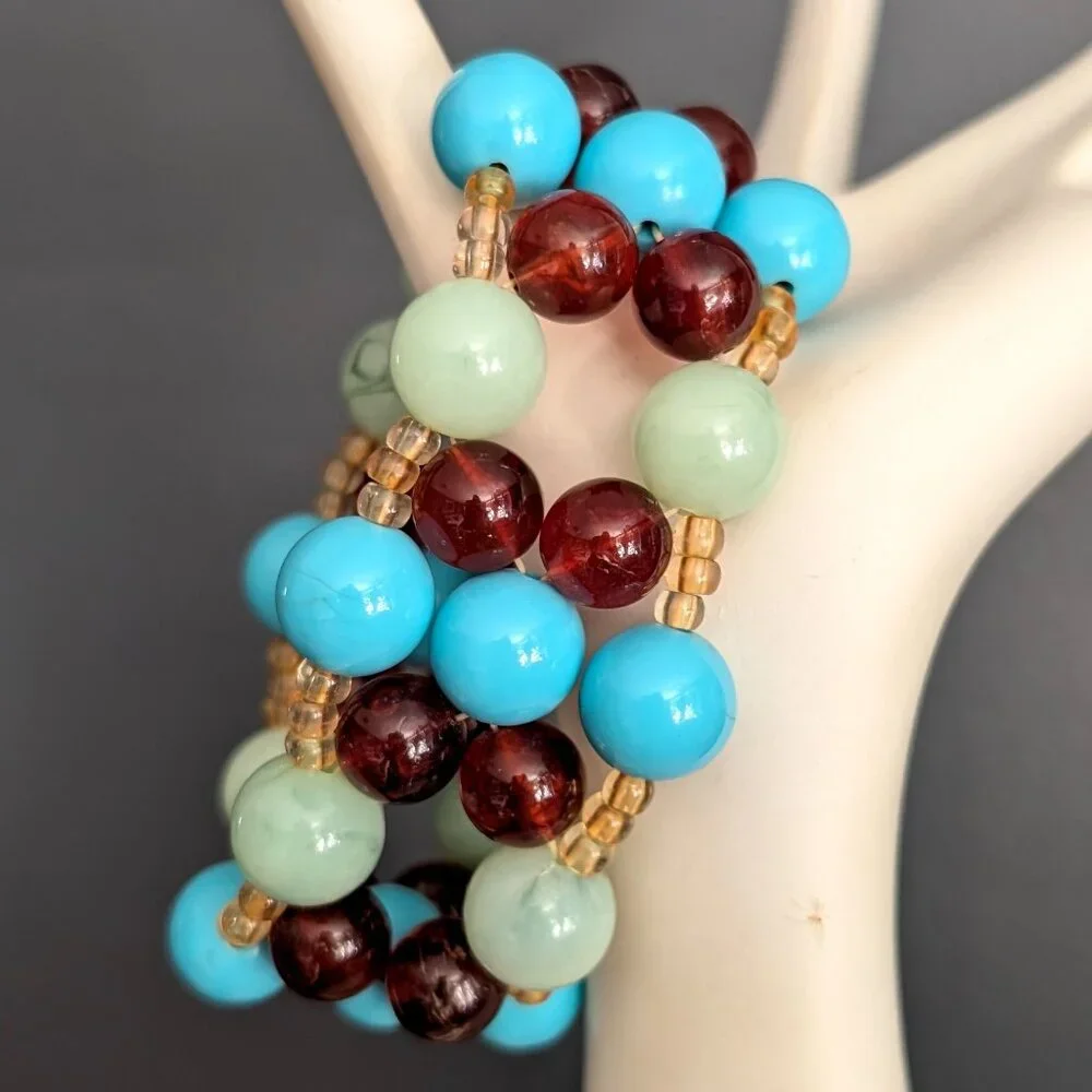 Blue, amber, green and pale yellow beaded stretch bracelet